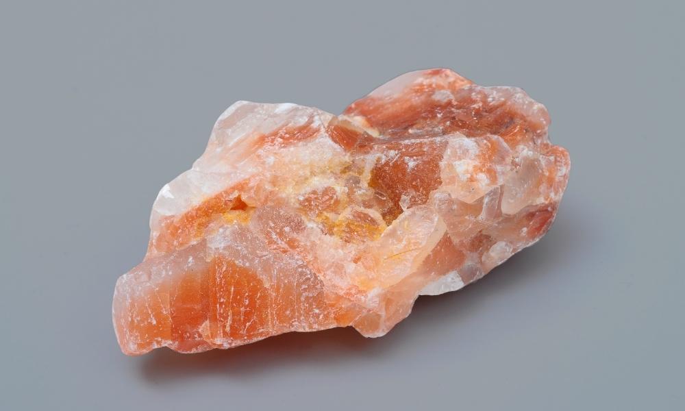 a close up of a red calcite class of red crystals