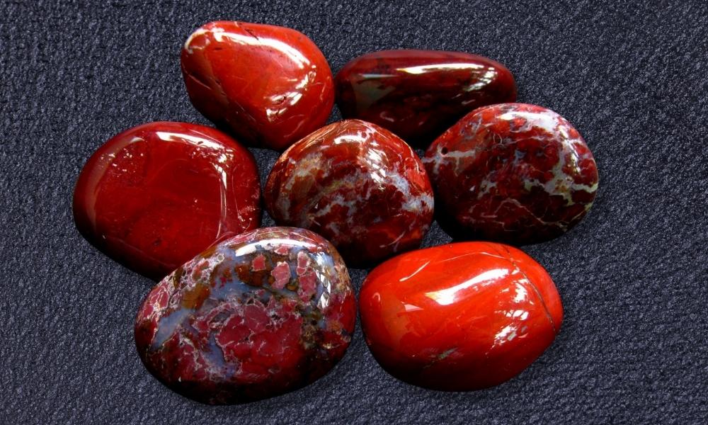 a group of red jasper class of red crystals