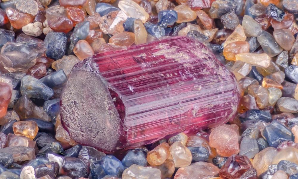 a close up of a rubellite class of red crystals