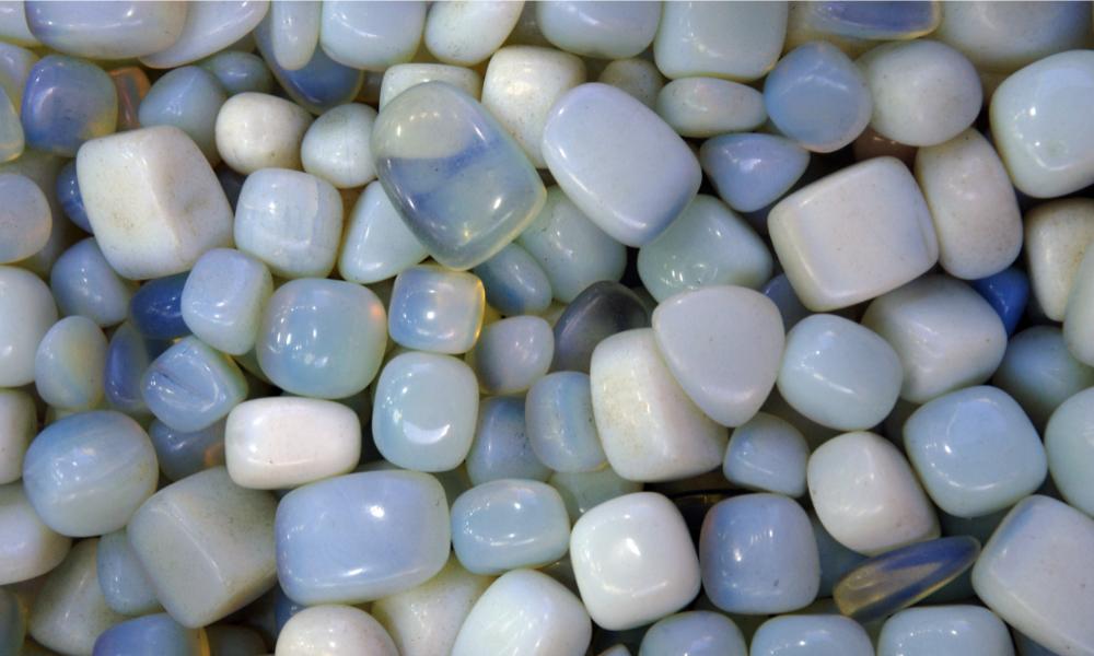 a pile of blue and white opalite stones