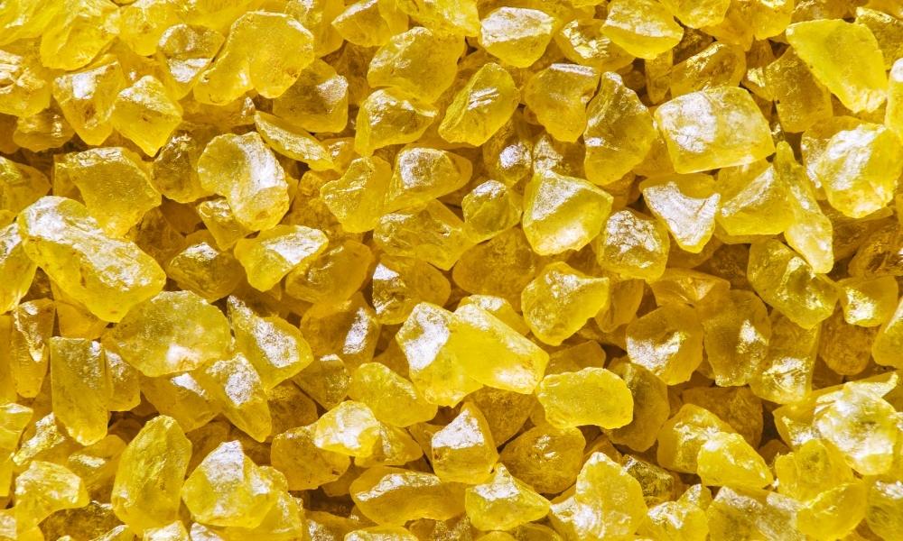 a pile of yellow crystals