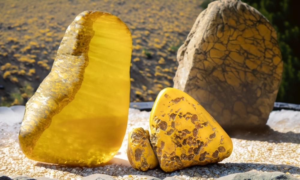 a group of yellow crystal rocks