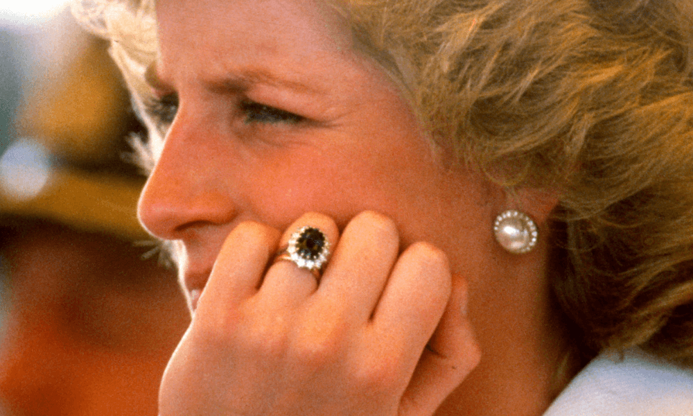 a close up of a princess of wales, princess diana wearing a vintage sapphire ring