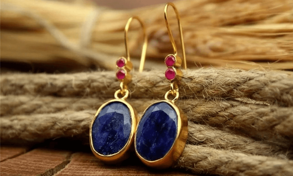 a pair of blue sapphire earrings
