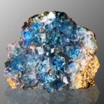 blue fluorite on grey and black gradient surface