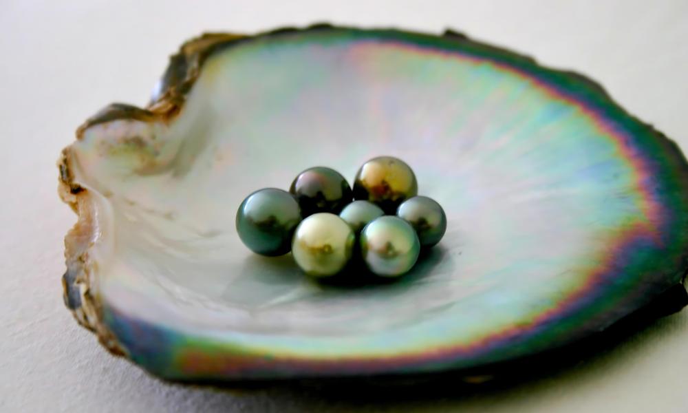 Origins of Green Pearls