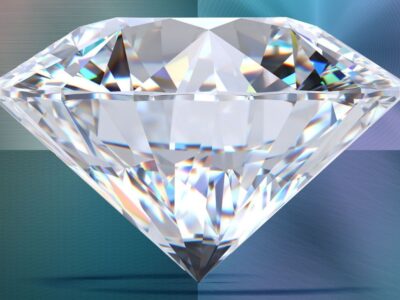 A shimmering diamond stone against a blue gradient background.