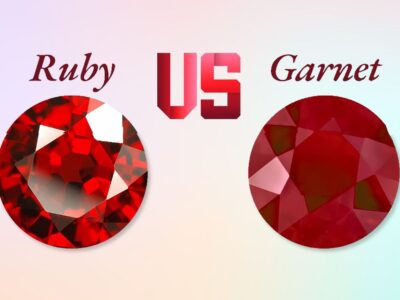 Comparison image of a red ruby and a garnet with ruby vs garnet caption.